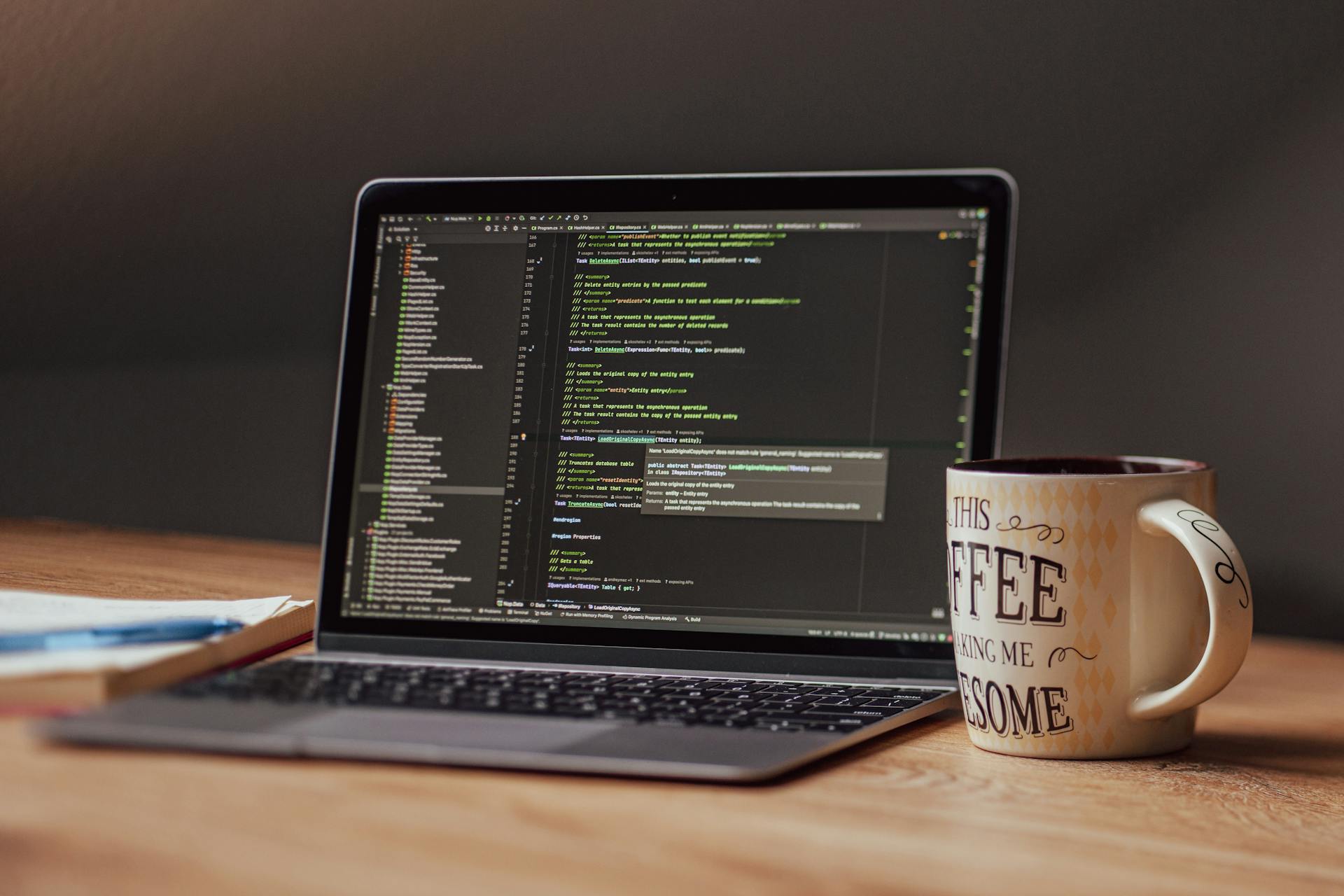 Developer workspace with laptop under deadline pressure for App Store submission