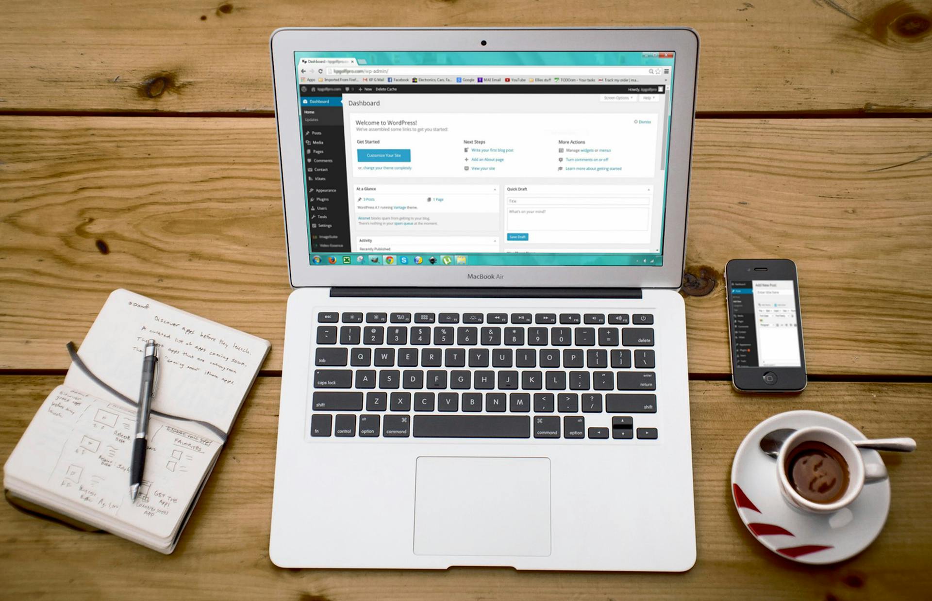 Developer workspace with laptop for iOS CI planning