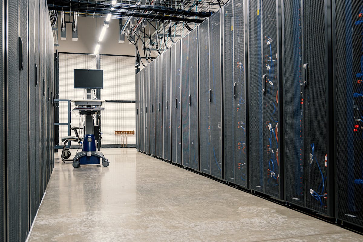 Server racks suggesting CI capacity planning for macOS pipelines versus Linux agents